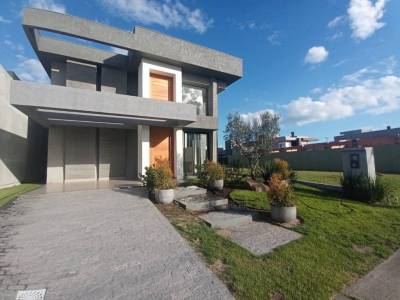 Casa em Condomínio 4 dormitórios para venda, CAPÃO ILHAS RESORT em Capão da Canoa | Ref.: 2394